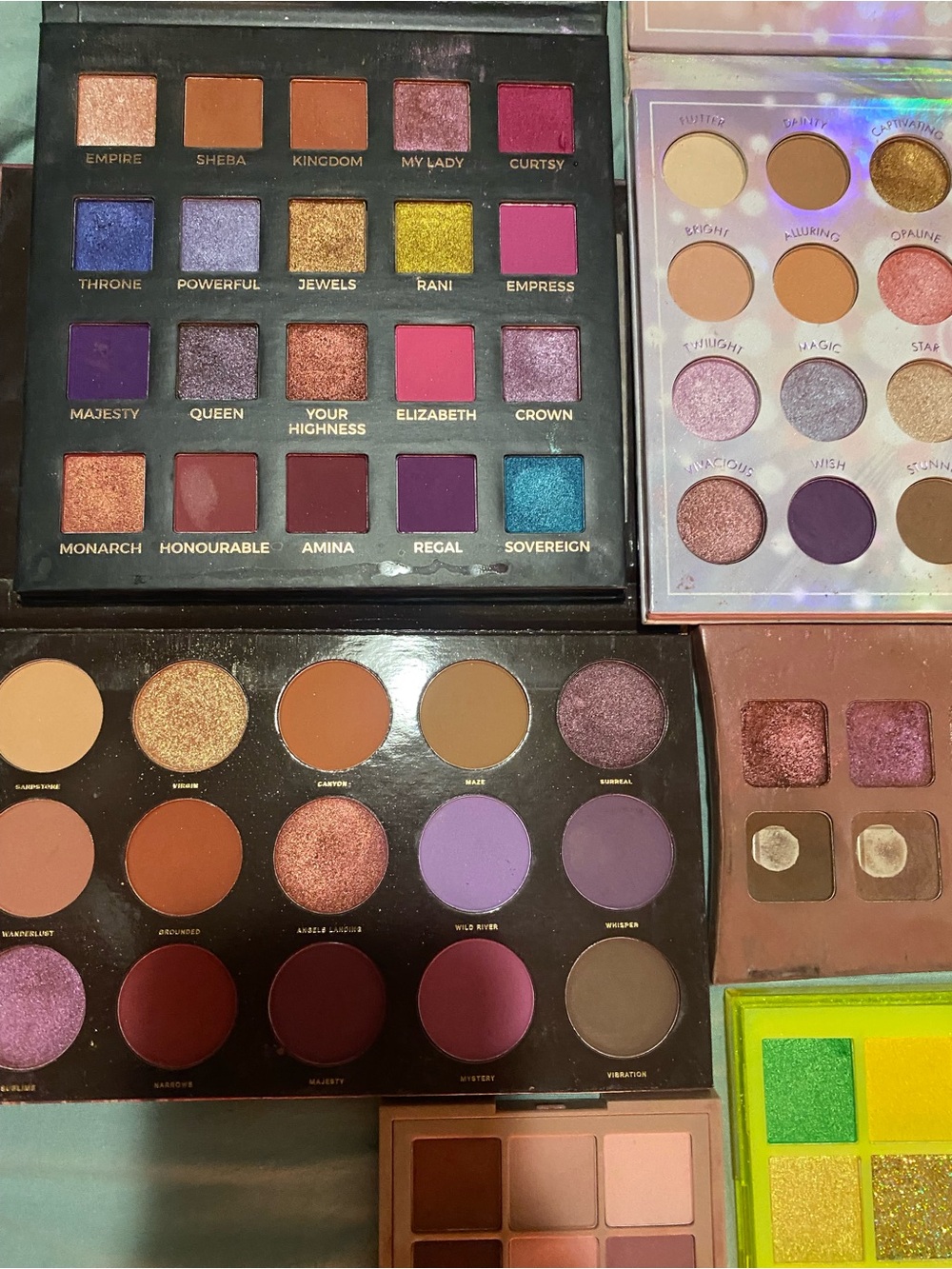 Used Stack of Assorted Makeup Palettes in Pastel, Black & Neon Yellow - Picture 4 of 5
